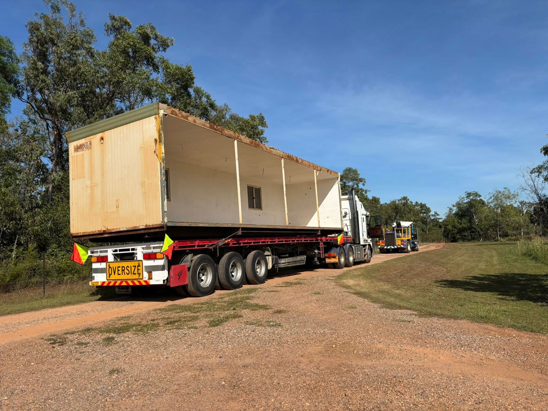 An oversized truck is driving on the road — Northern Franna Cranes NT in Borroloola, NT