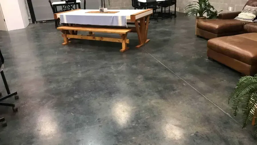 Empty, bright hallway leading to a bright window at the end. Empty, bright hallway leading to a bright window at the end.