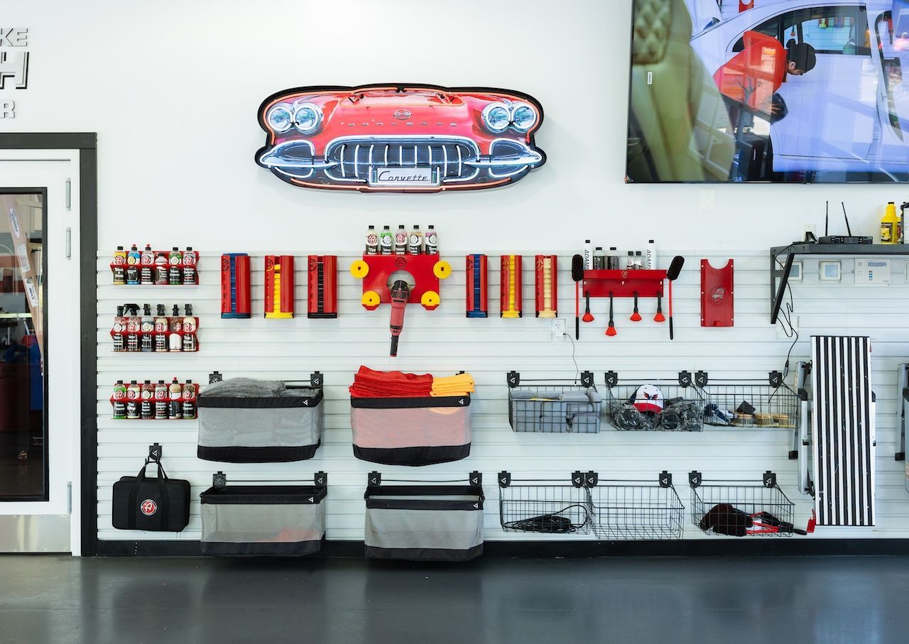 Wall display of colorful merchandise and shelves in a bright retail store interior