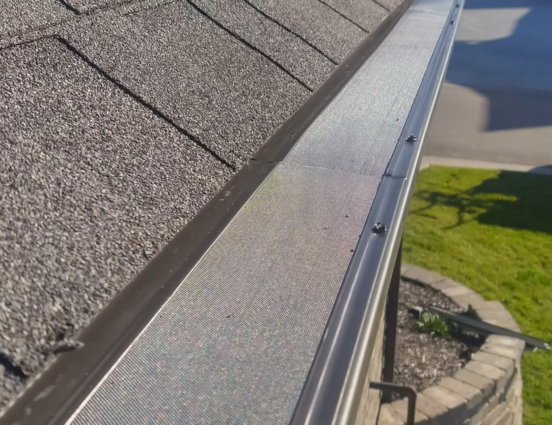 A close up of a gutter on a roof