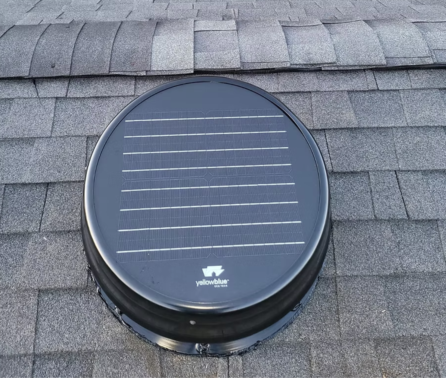 A solar panel is sitting on top of a roof