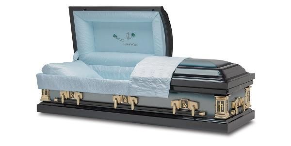 Open casket, black and grey with light blue interior and golden hardware.
