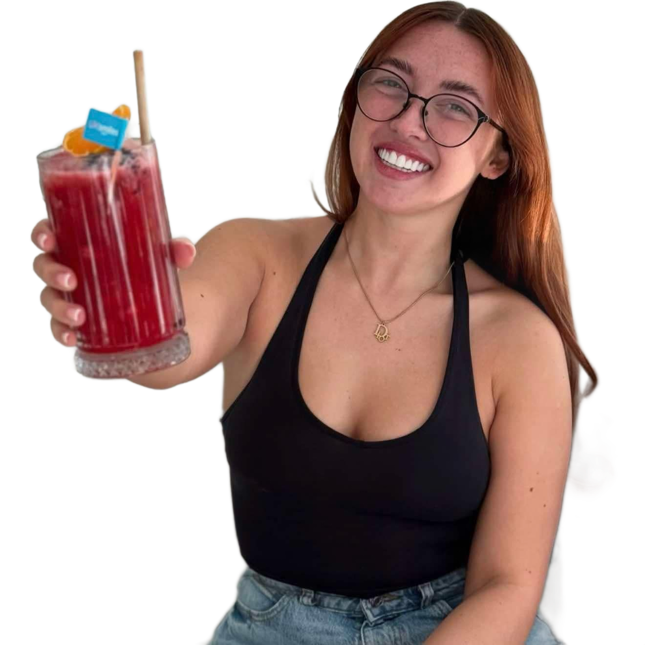 Woman smiles, holds a red drink with a straw. She wears glasses and a black top.