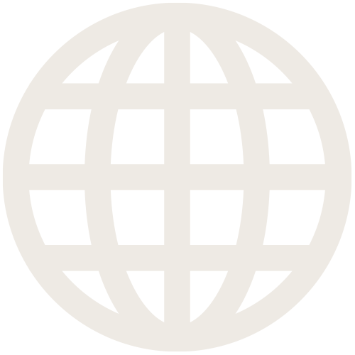 Three people at a table reviewing a chart; one points to it.