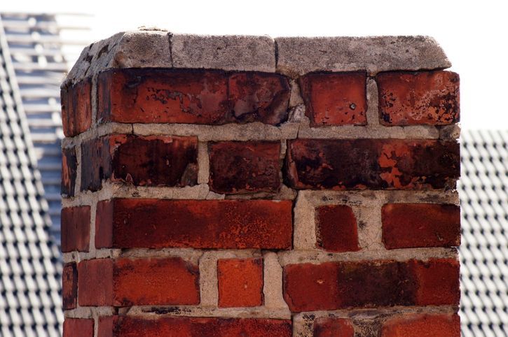 Why are the bricks on my chimney falling apart?