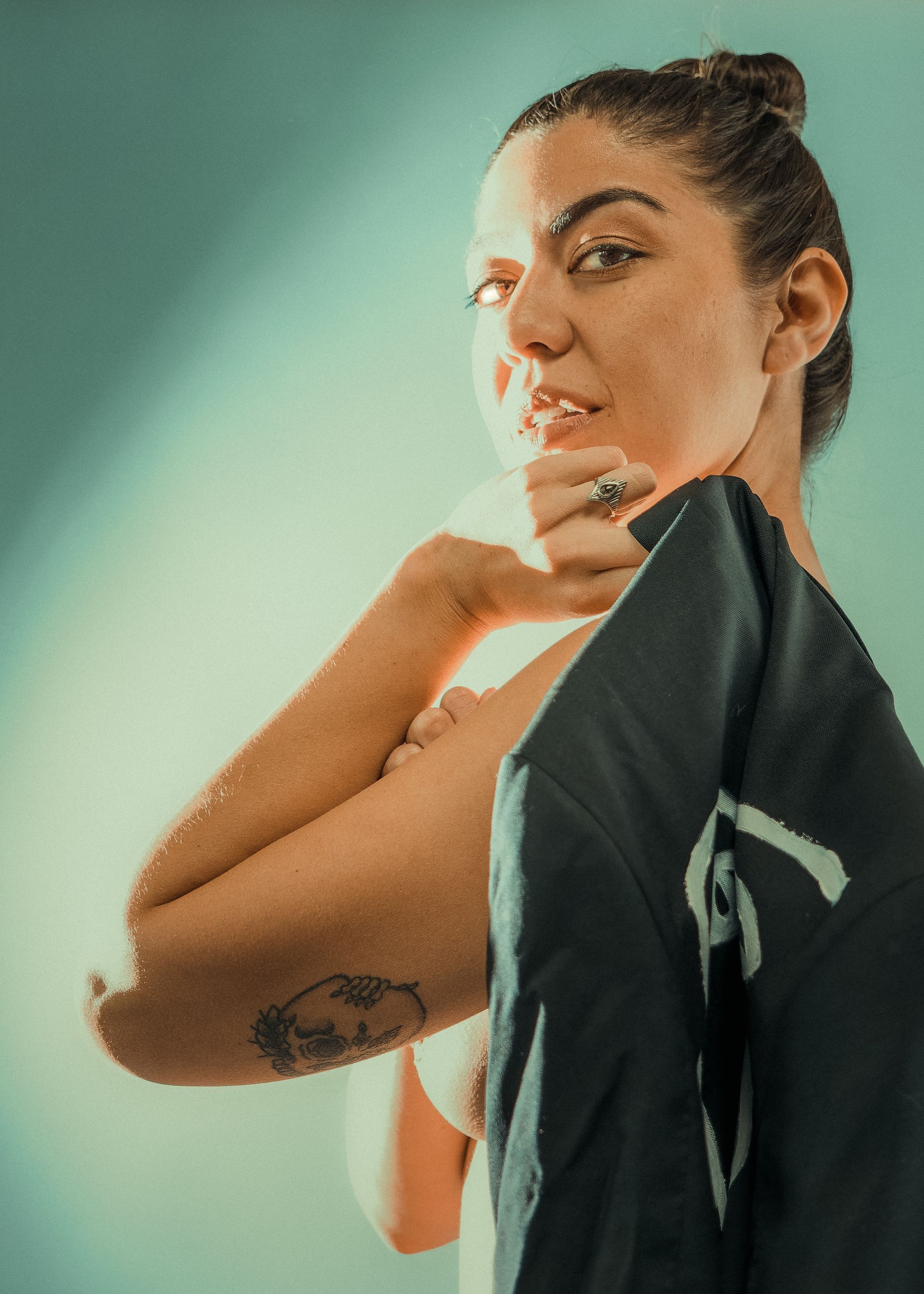 Maro, asian model with tattoos poising for Beauty In Space - Will Evans