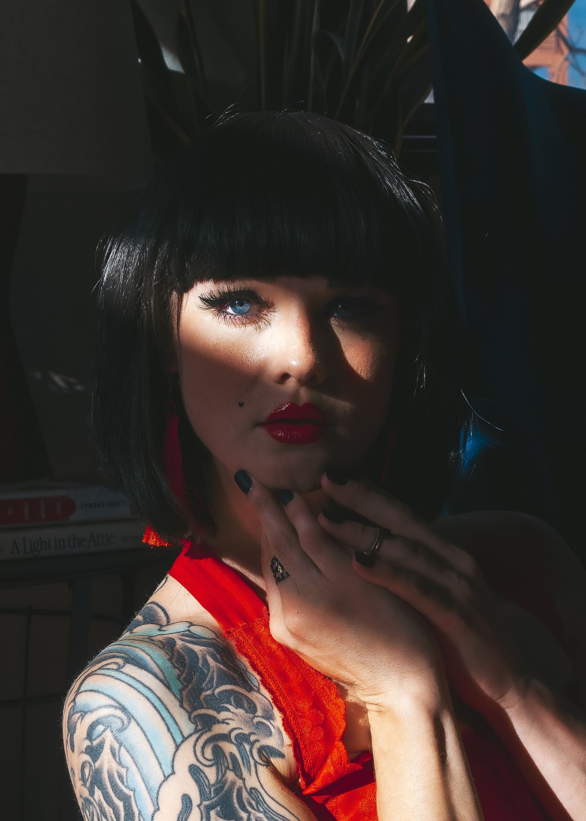 Jackie, brunette model with tattoos poising for Beauty In Space - Will Evans