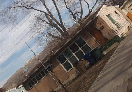 Yard Care On Residential House — Salt Lake City, UT — Big City Tree Experts