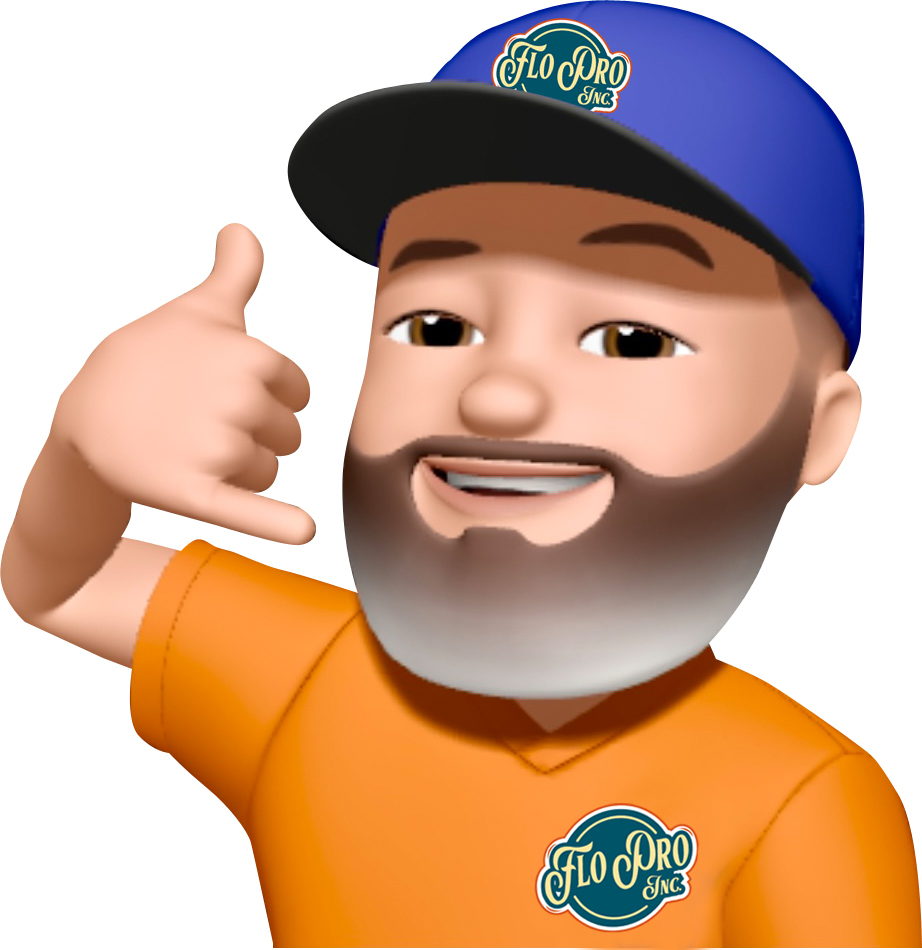 Person in a hard hat on a ladder installing a ceiling light fixture