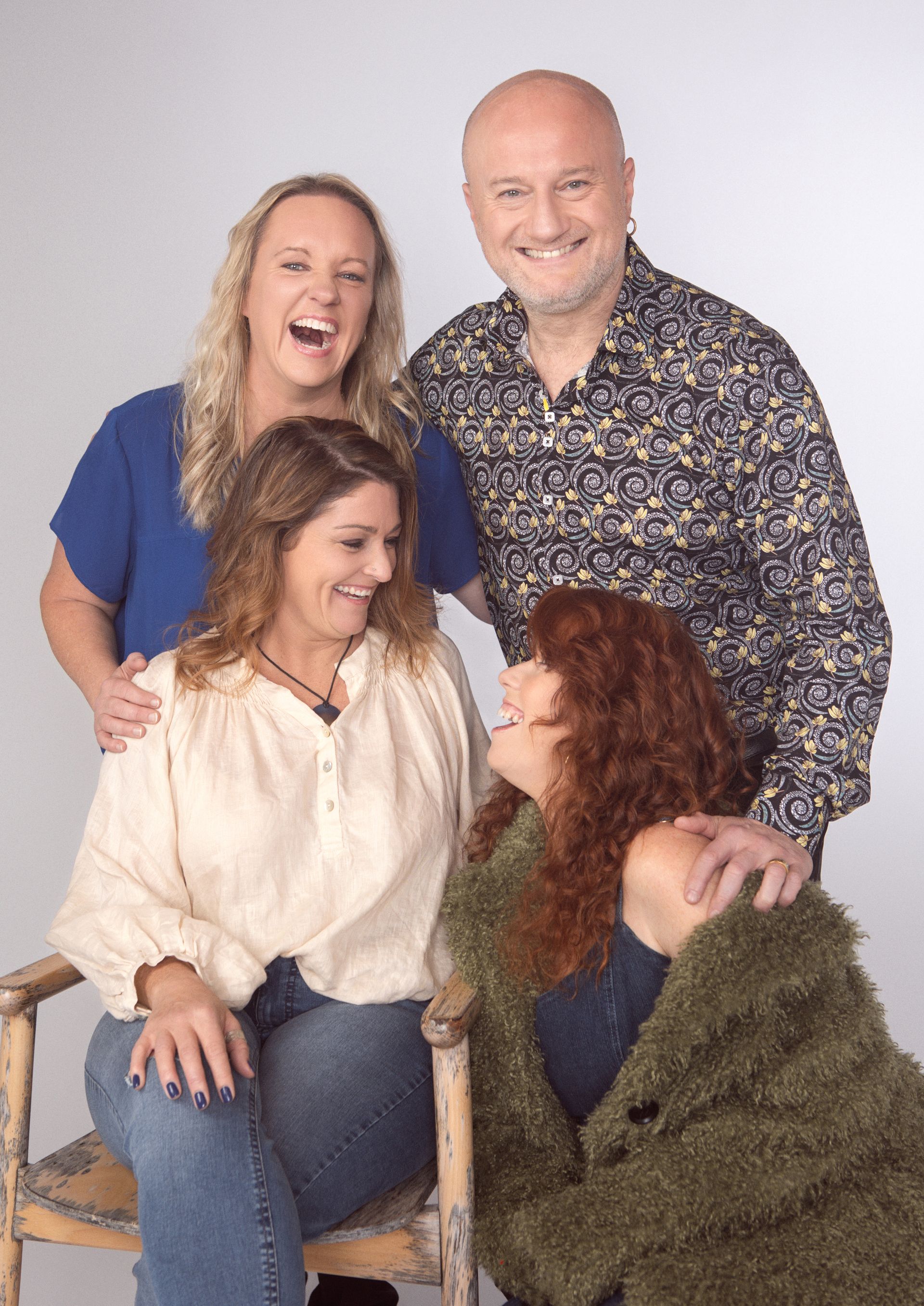 Woman With Satchel Pushing Wheelchair And Talking To Disabled Student In Library — Heal Connect in Long Jetty, NSW