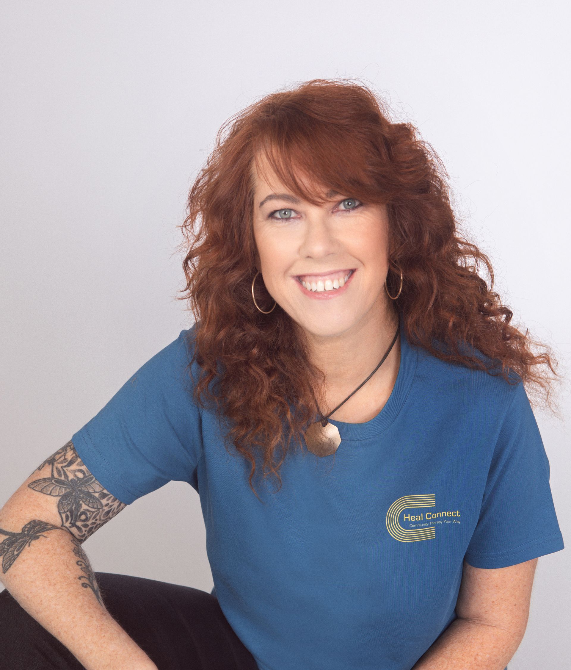 Disabled Child In A Wheelchair Relaxing Outside With A Care Assistant — Heal Connect in Long Jetty, NSW