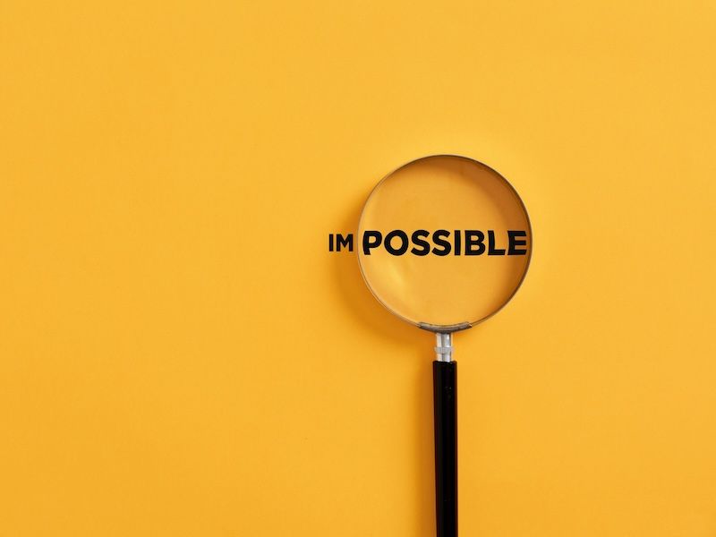 A Woman Is Sitting Next to An Elderly Woman in A Wheelchair — Heal Connect in Central Coast, NSW