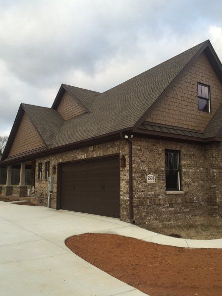 Custom Home with brown roof - B & B Roofing in Decatur, AL