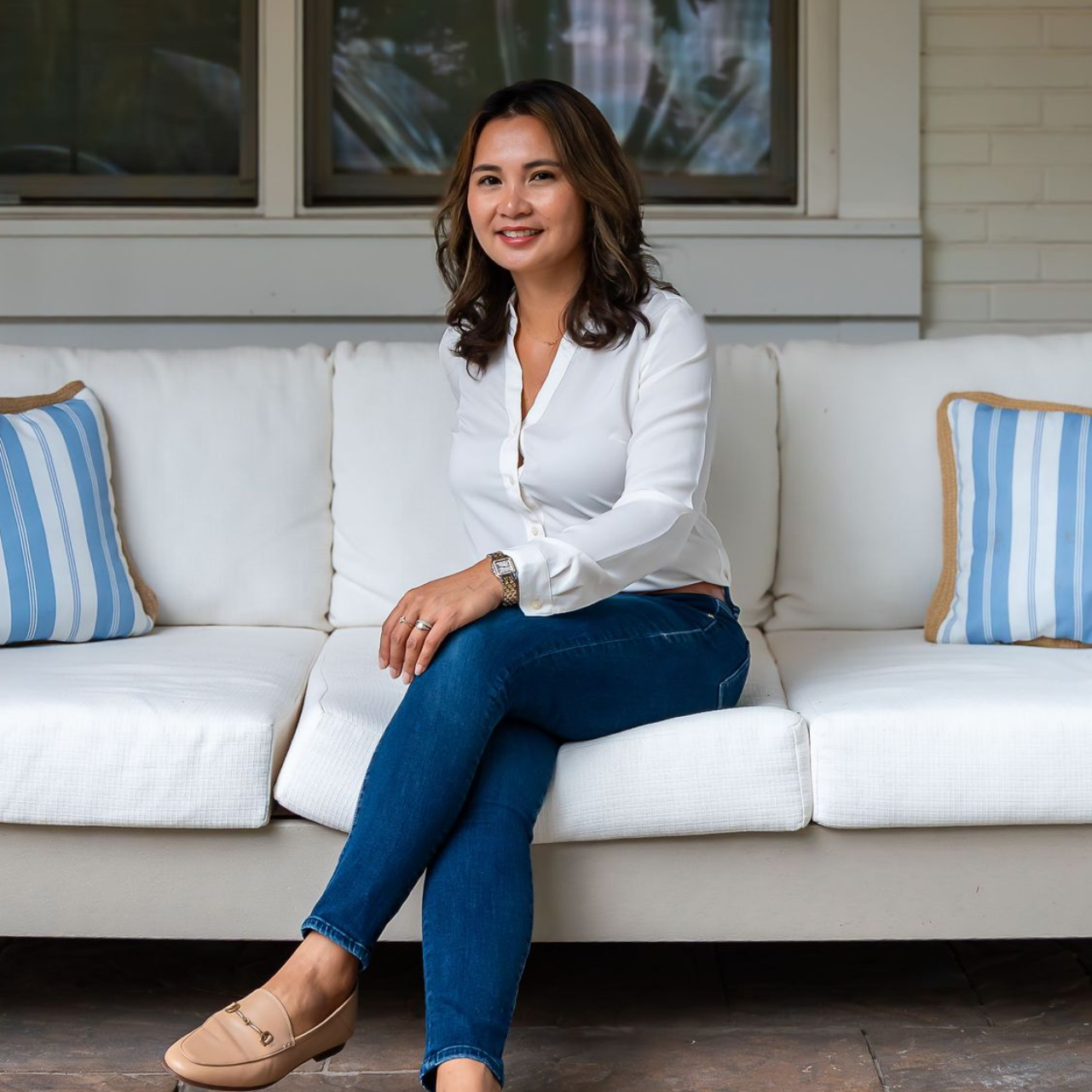 A woman and a child are eating cookies together.