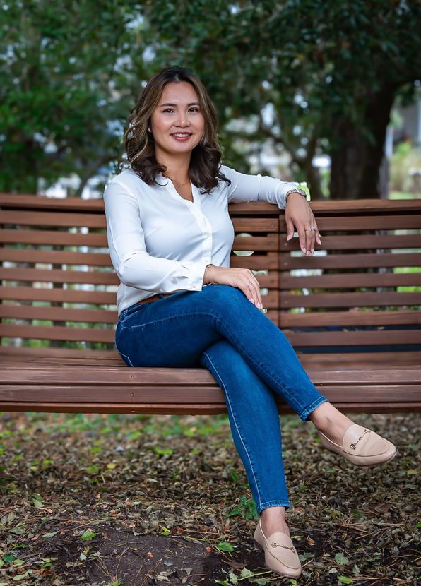 Jamaila on the couch outsied