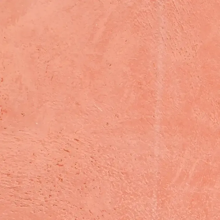 A close up of a pink leather texture.