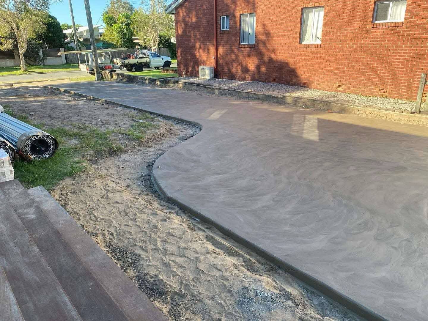 A freshly poured concrete driveway