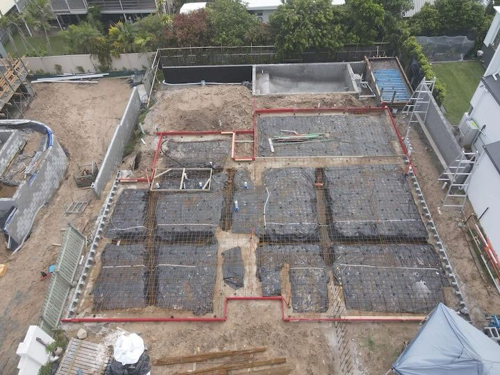 An aerial view of a concrete slab about to get poured.