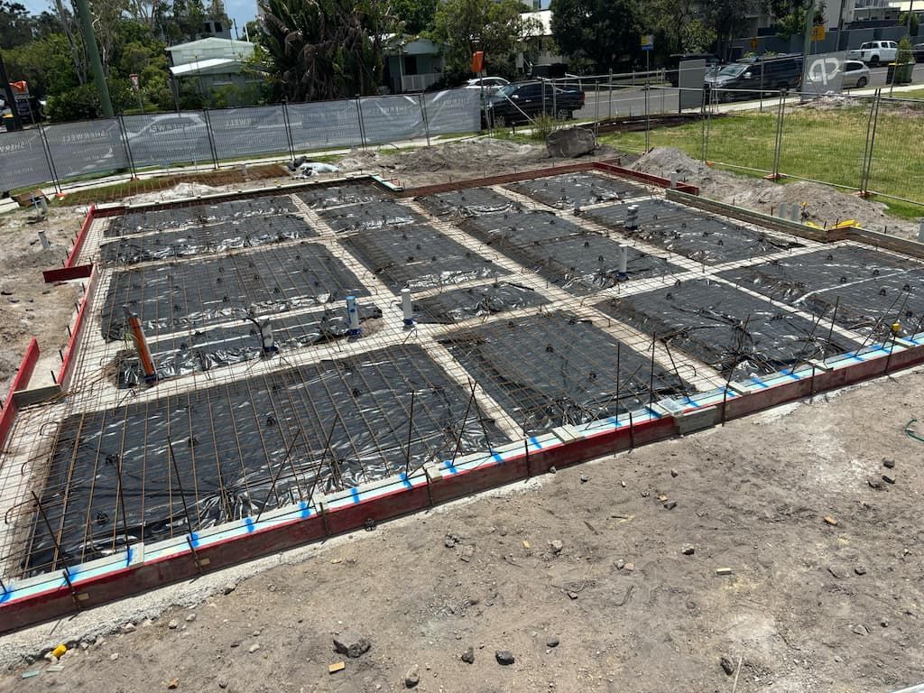 A concrete base for a house is being built on the Sunshine Coast