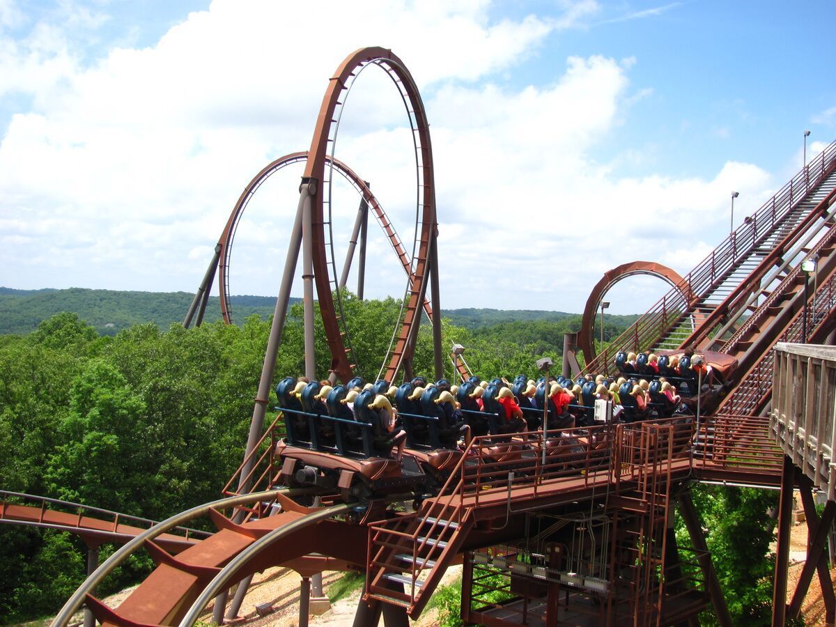 A roller coaster with a lot of people on it