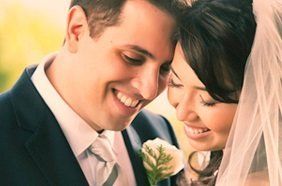 Wedding photo with bride and groom