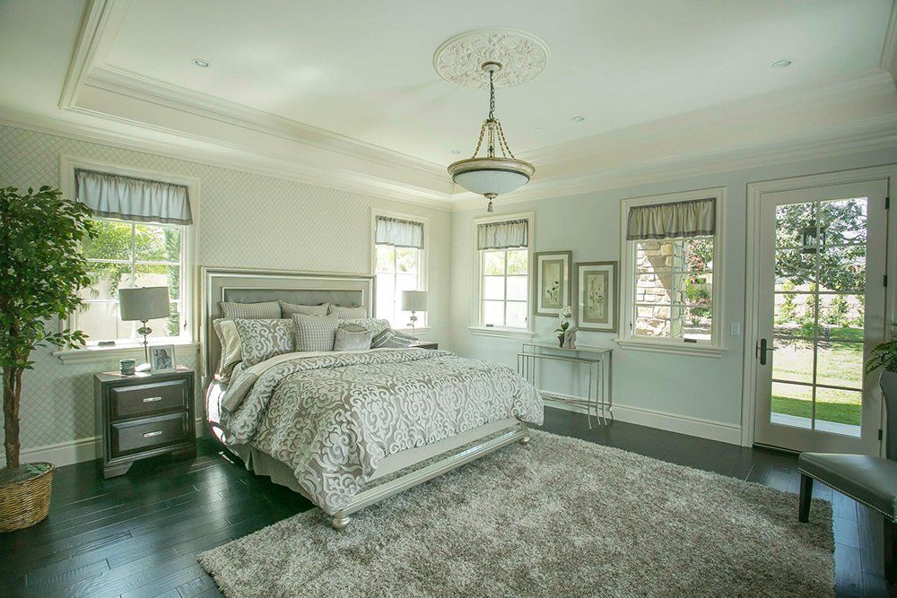 There is a large bed in the middle of the room.