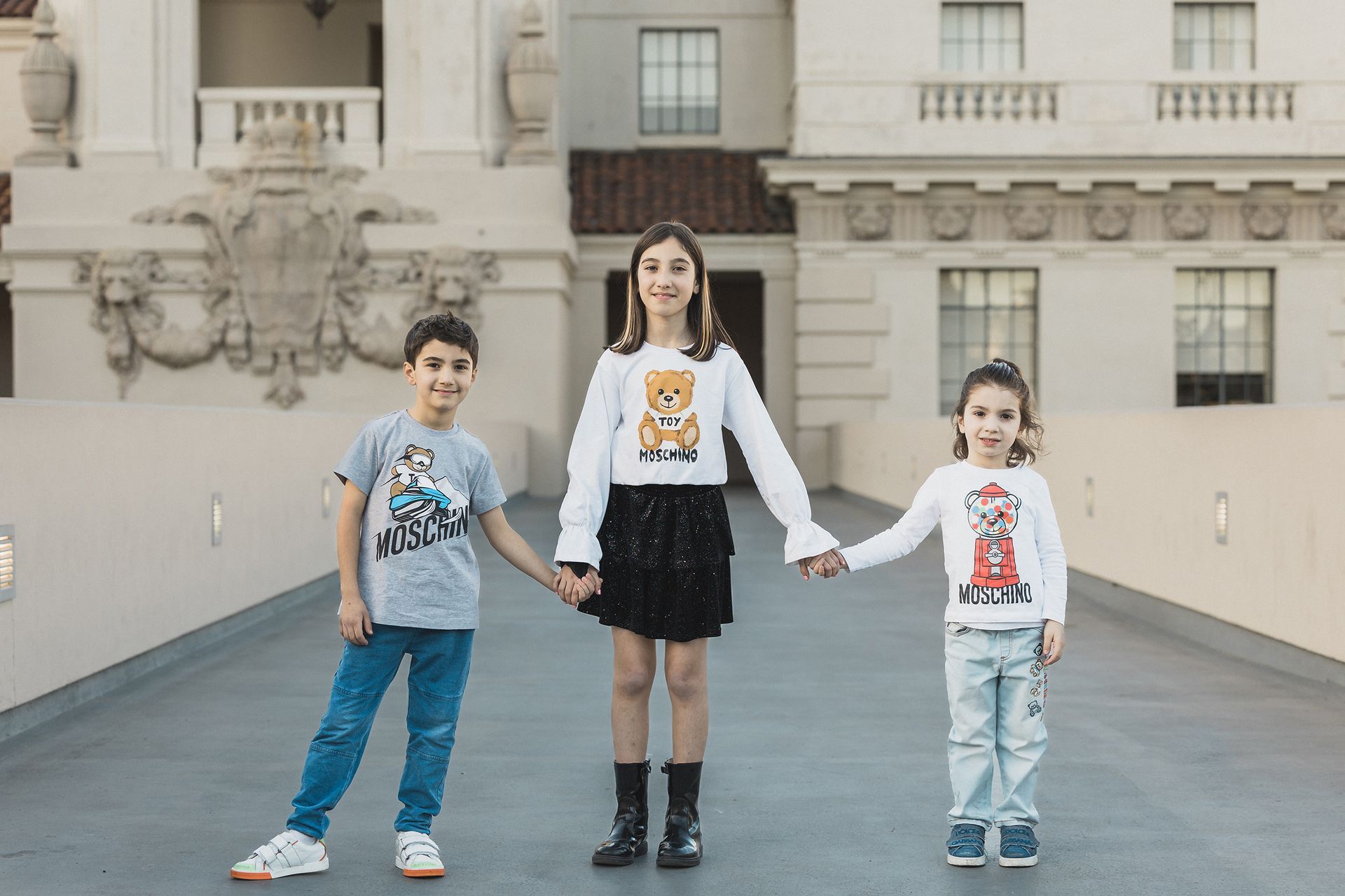 Take a close-up shot focused on the hands of three generations (like a grandparent, parent, and child) clasping each other's hands. This emphasizes the connection between generations and captures the love and support passed down in the family