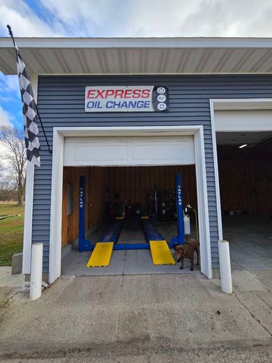 A garage with a sign that says express oil change