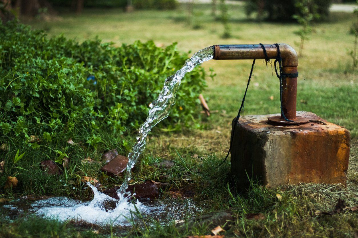 Tube Sprinkling Water from a home water well