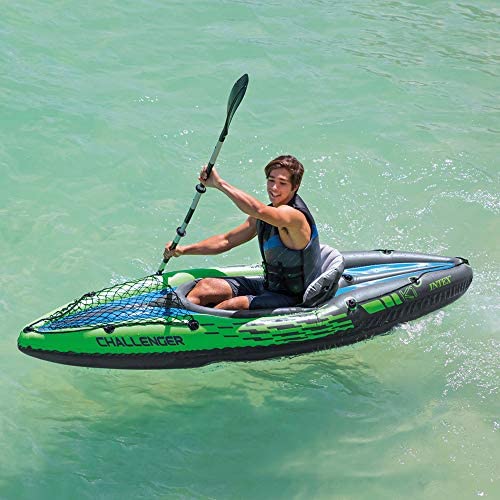 Young man in a inflatable kayak
