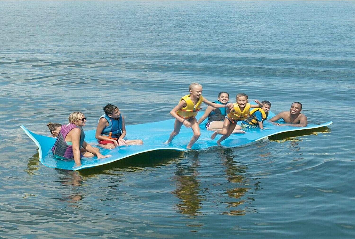 Group of children on floating water pad