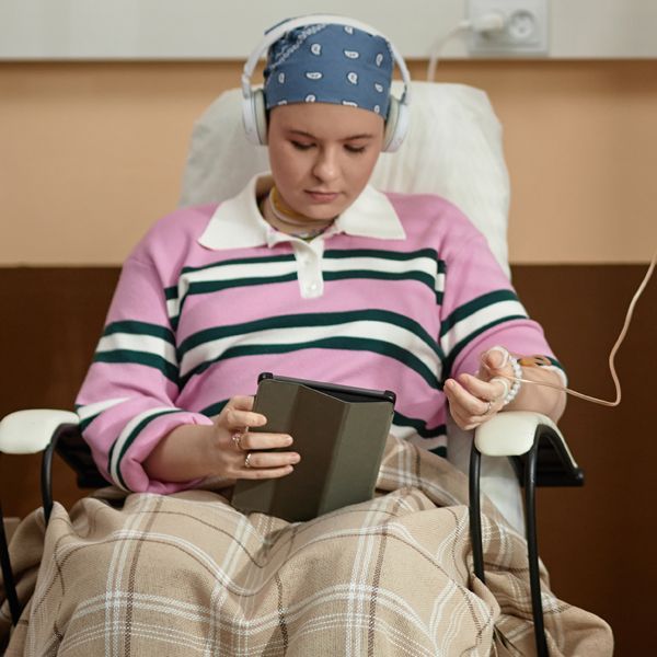 woman getting chemotherapy Contacting Holistic Energy Bodyworks Practitioners for a Free Consultation on Energy Healing for Cancer Support