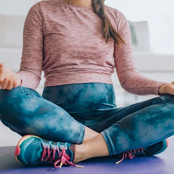 Woman doing yoga as part of her Healing Energy Focus is Applied During the First Trimester