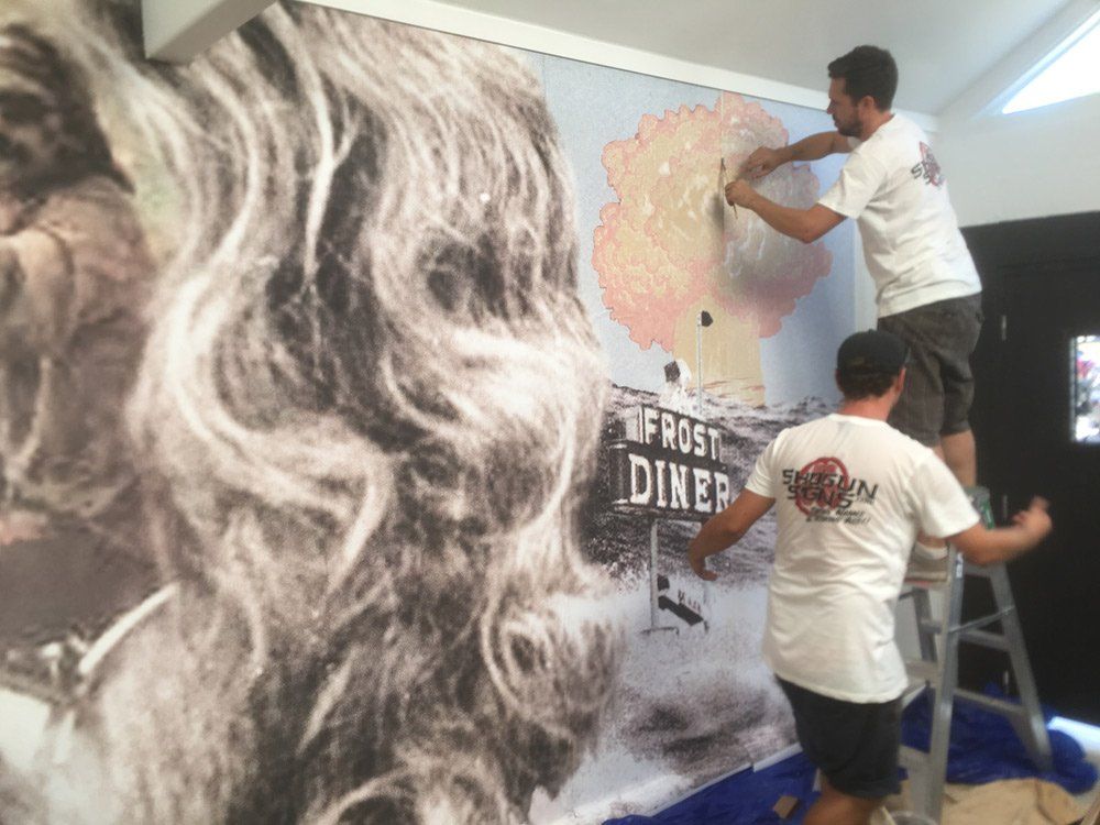 Team working for Custom Wallpaper — Shogun Signs & Print Pty Ltd in Tweed Heads South, NSW