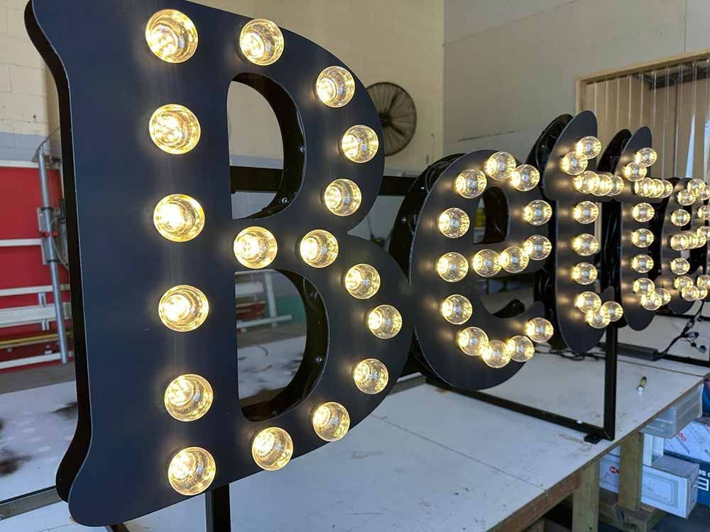 Marquee Sign With Light Bulb Lettering — Shogun Signs & Print