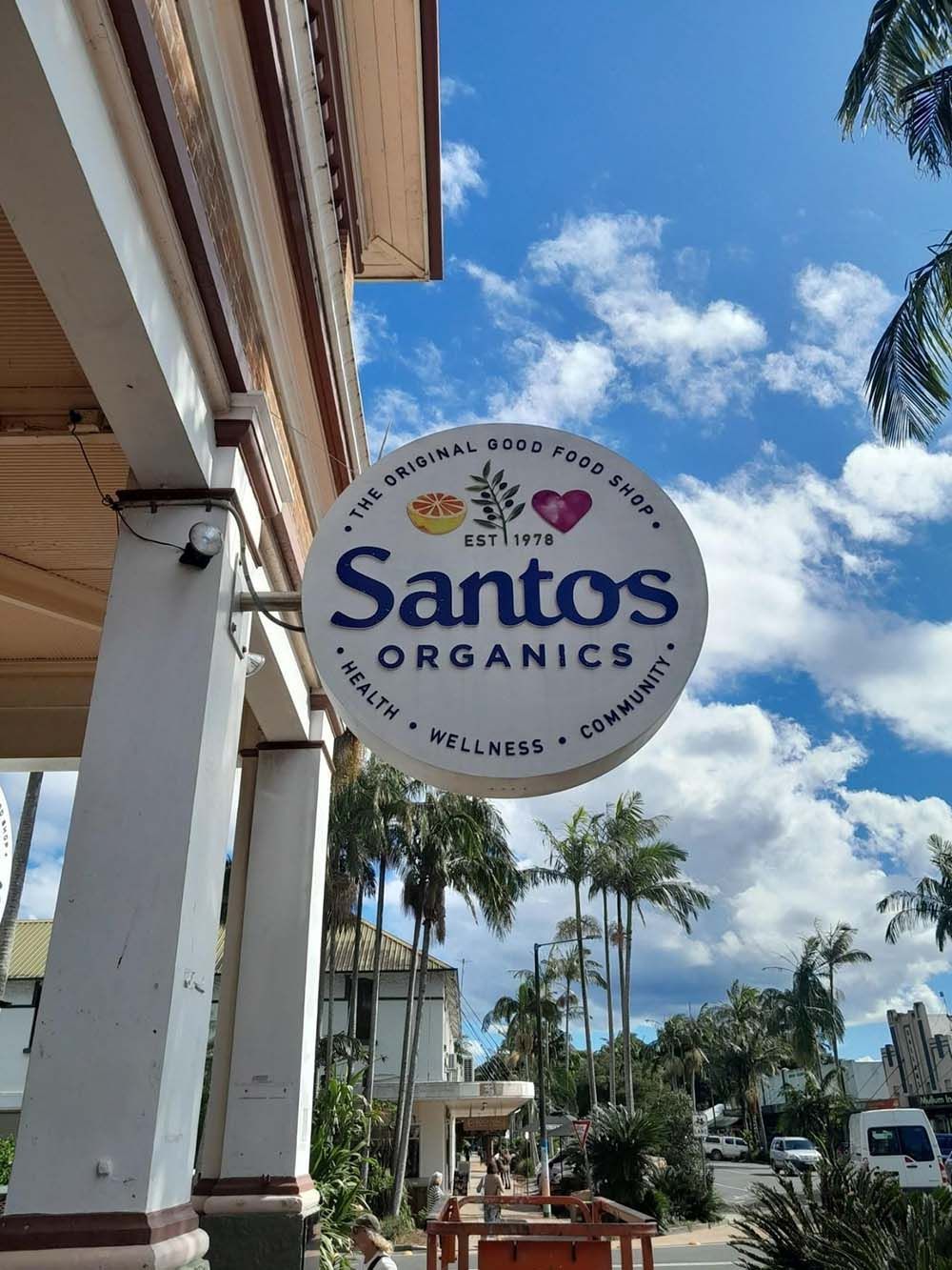 Circular Storefront Sign For Santos Organics — Shogun Signs & Print