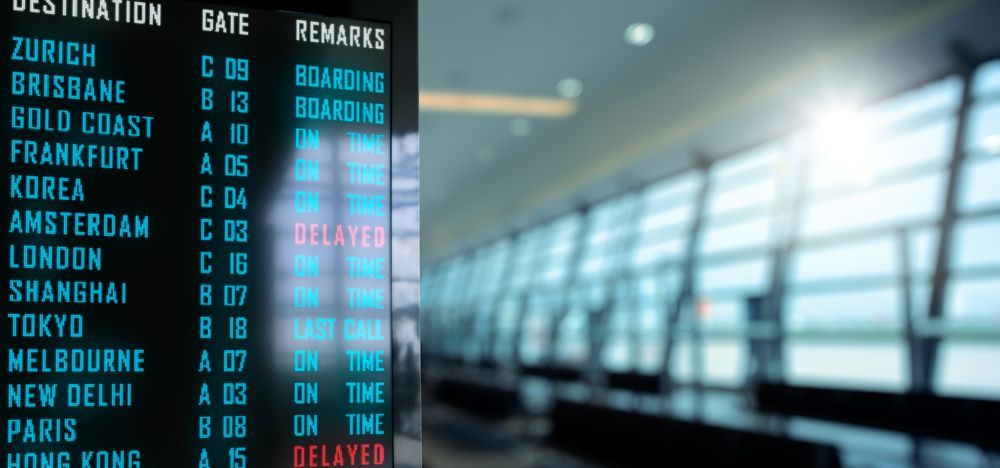 A Blurred Image of An Airport Departures Board — Shogun Signs & Print Pty Ltd in Tweed Heads, QLD