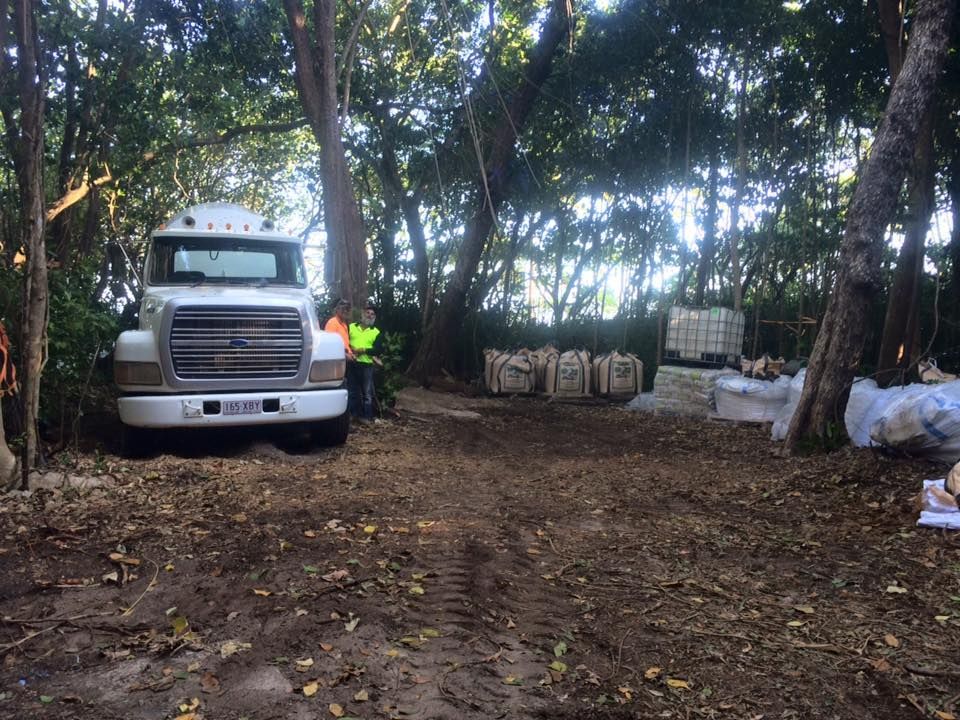A White Truck is Parked in the Middle of a Forest — Far Northern Concrete Pumping in Croydon, QLD