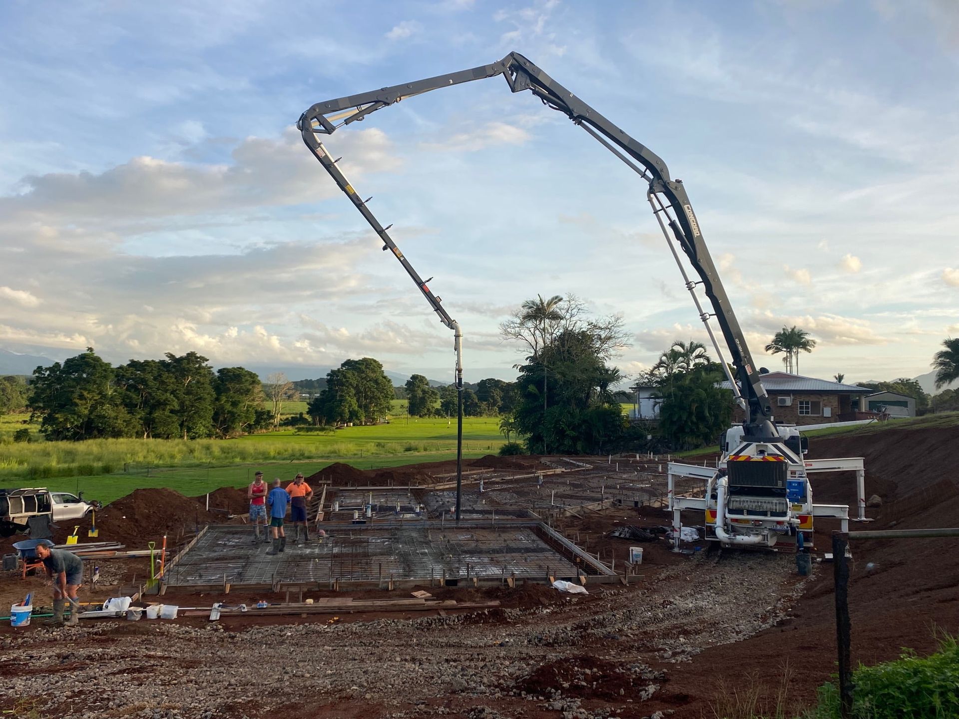 Truck Pumping Concrete for Residential Slab — Far Northern Concrete Pumping in Mareeba, QLD
