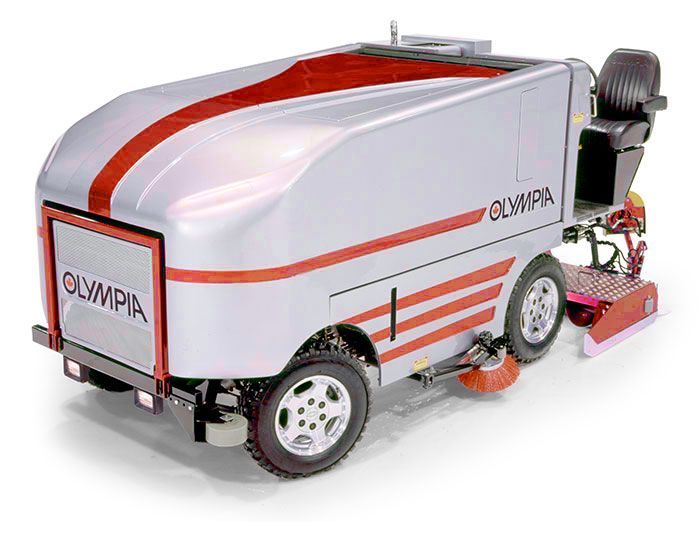 A silver and red olympia ice hockey machine is sitting on a white surface.