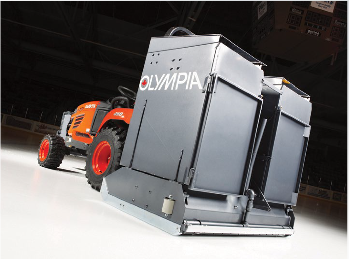 A tractor with olympia written on the side of it