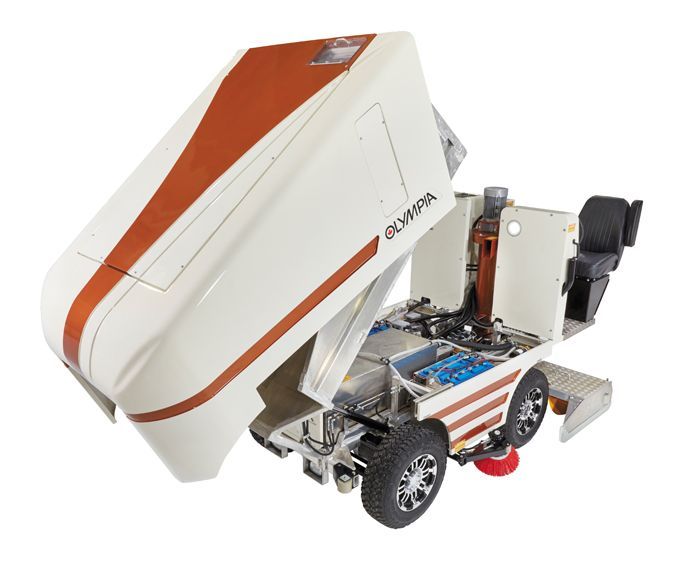 A white and orange olympus vacuum cleaner with the lid open