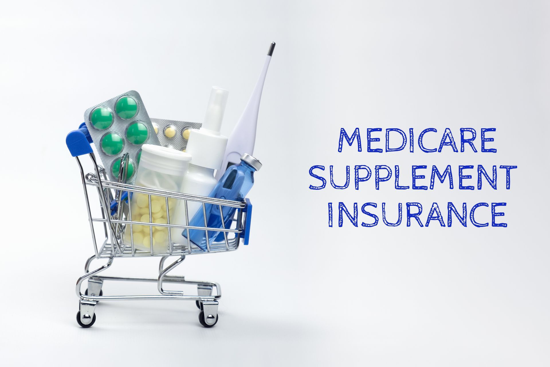 Tiny shopping cart full of medicines next to an inscription: “Medicare supplement insurance”.
