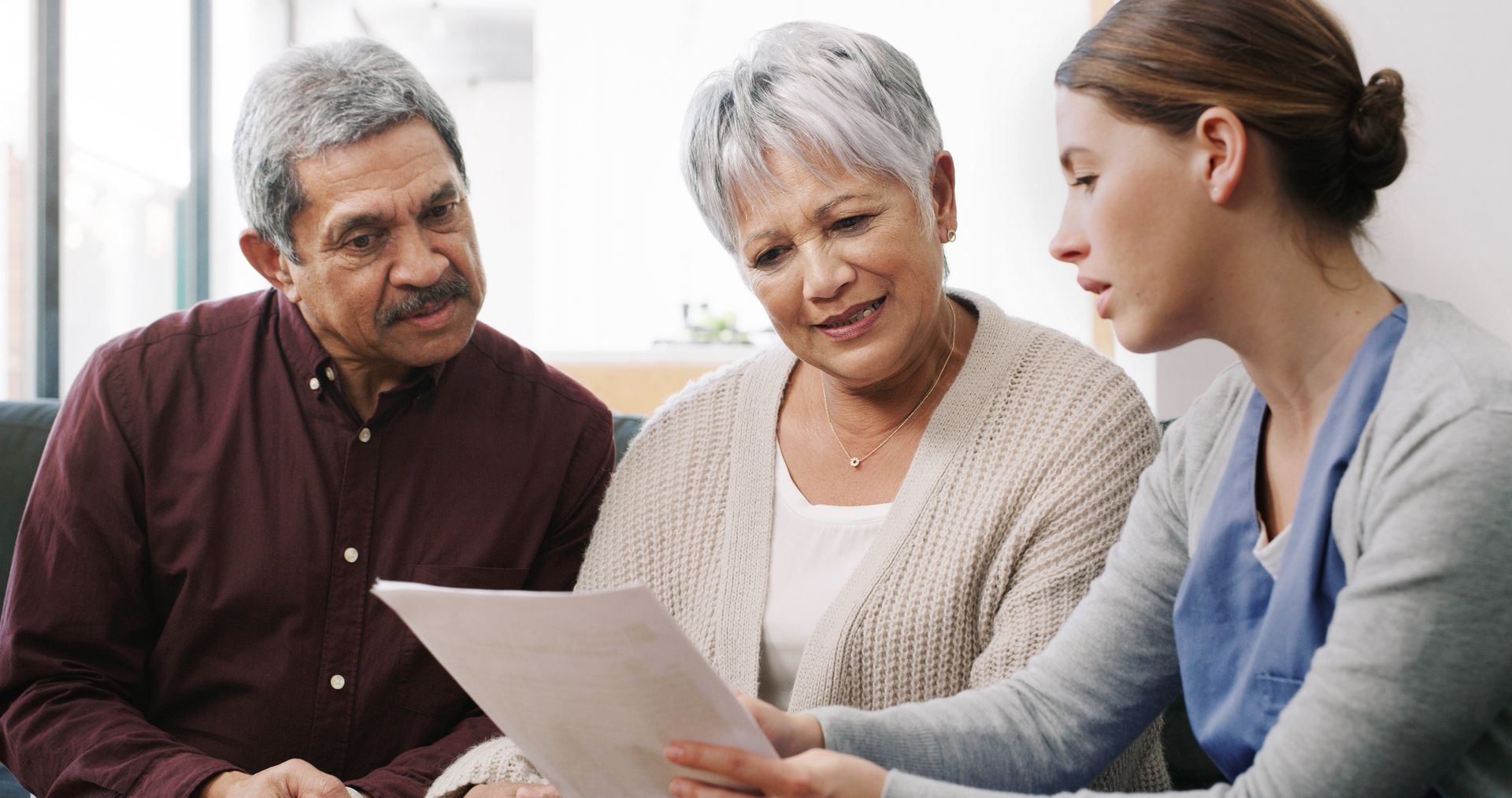 A senior couple having a consultation at home.