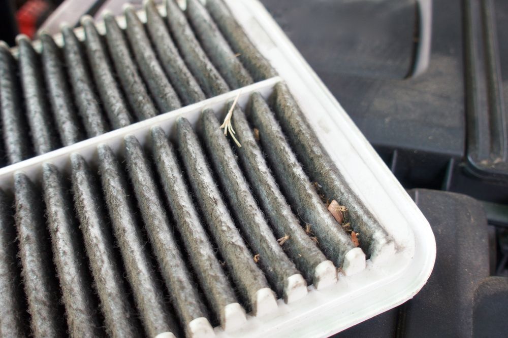 Dirty Car Air Filter, Close-up — A.M.D. Automotive Services in Mackay, QLD