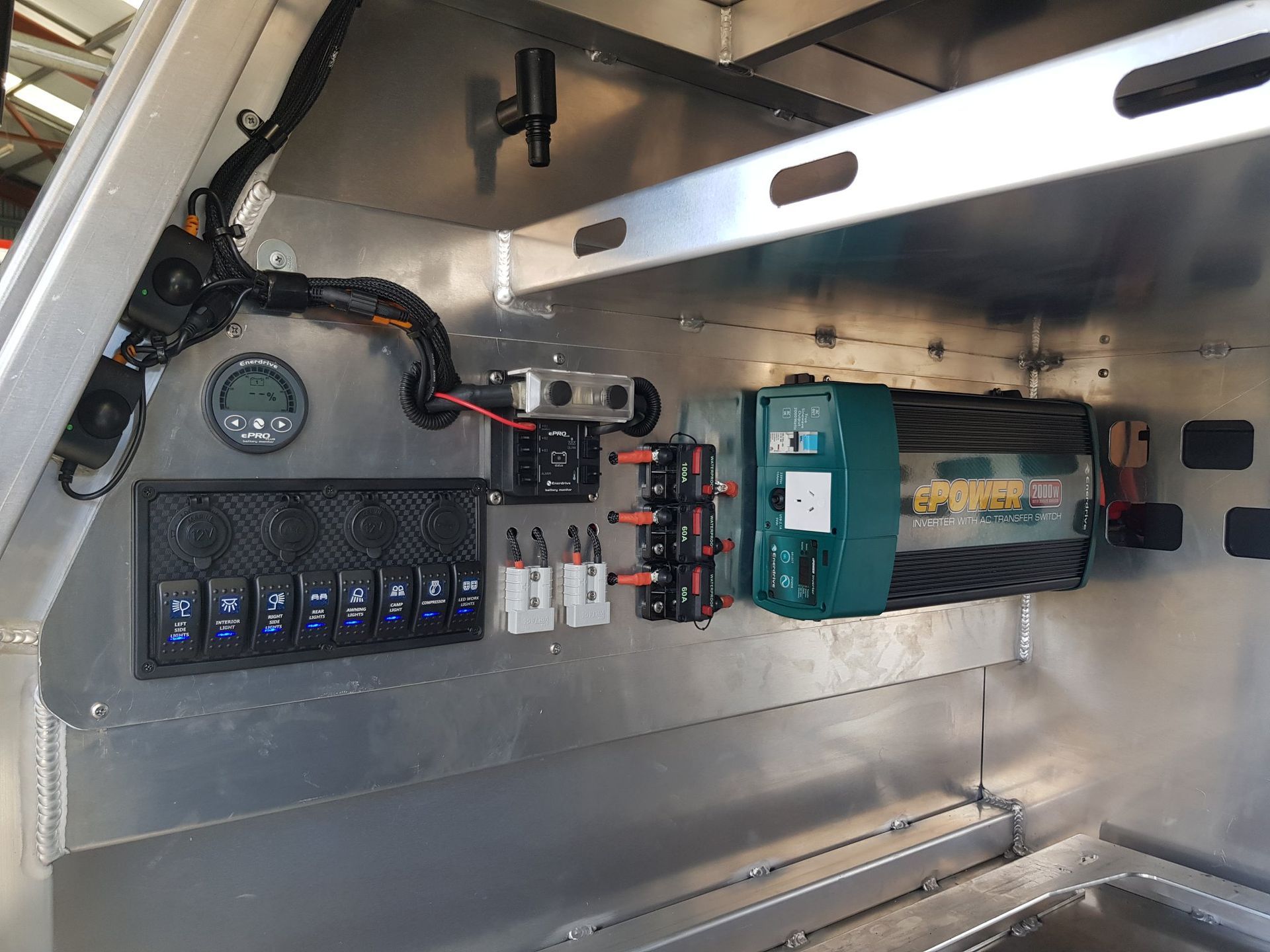 Aluminum Electrical Panel With Switches, Gauges, and a Power Outlet — A.M.D. Automotive Services in Mackay, QLD