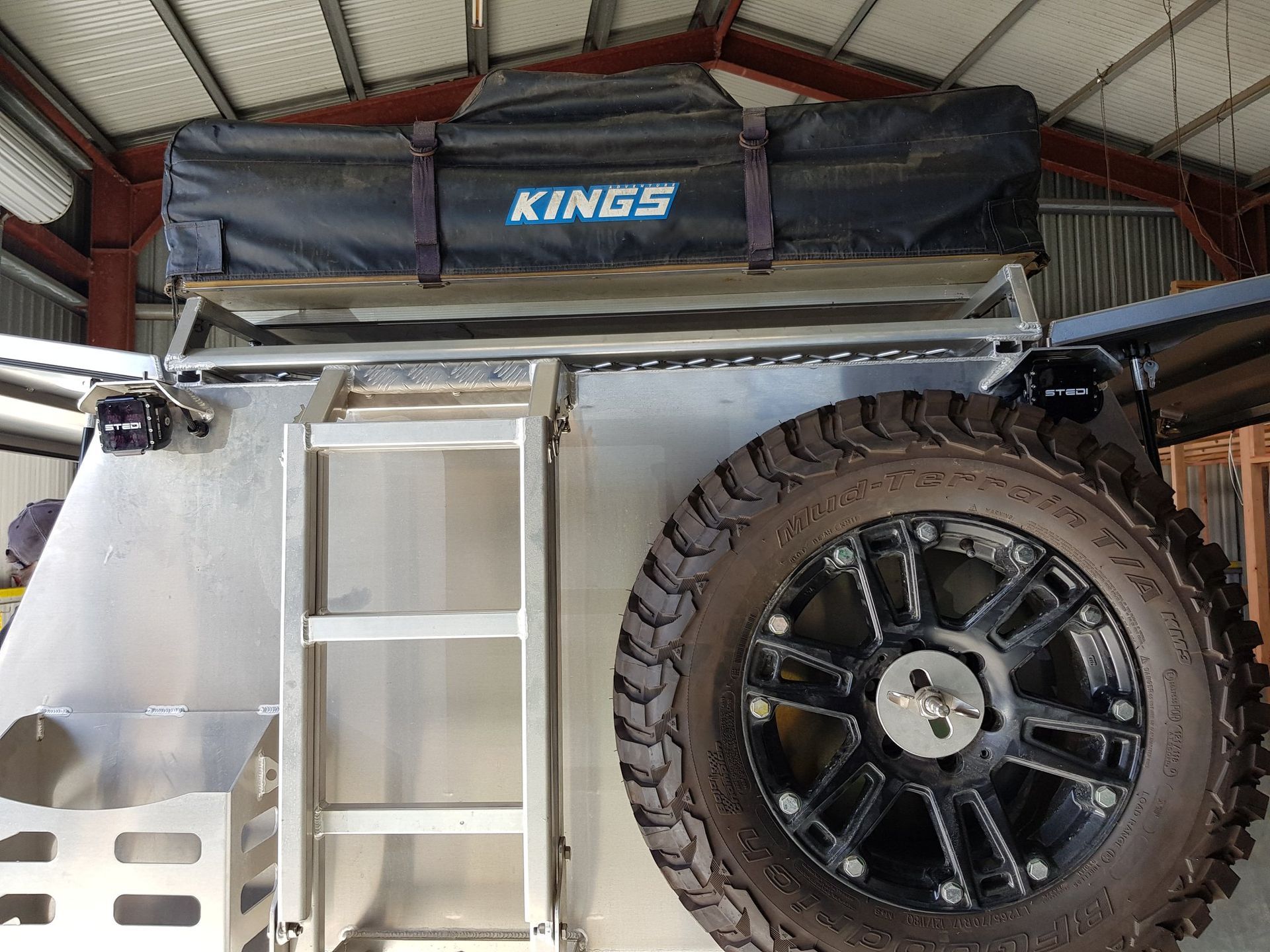 Off-road Trailer With Roof-top Tent Secured — A.M.D. Automotive Services in Marian, QLD