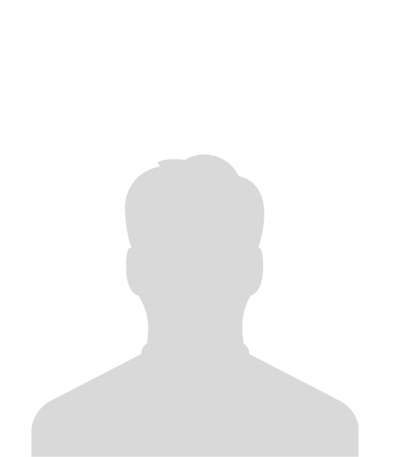 A smiling doctor in a lab coat with a stethoscope around his neck.