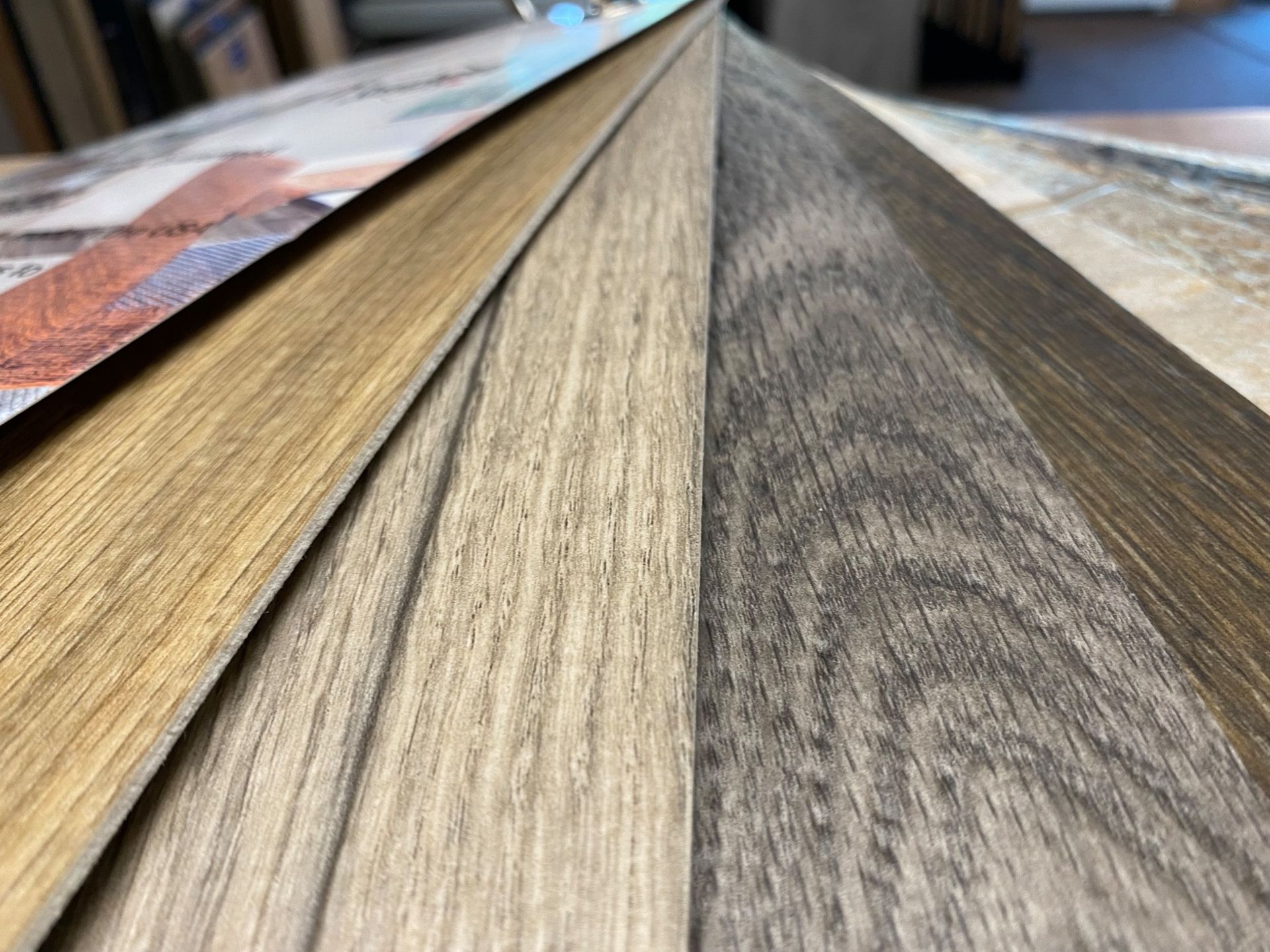 A close up of a stack of wooden boards on a table.
