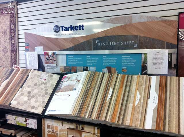 A display of different types of flooring in a store.